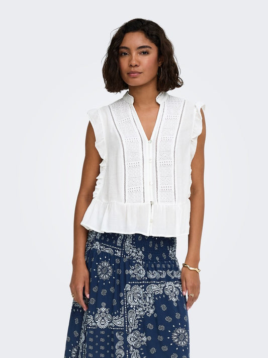 Camicia smanicata ricamata