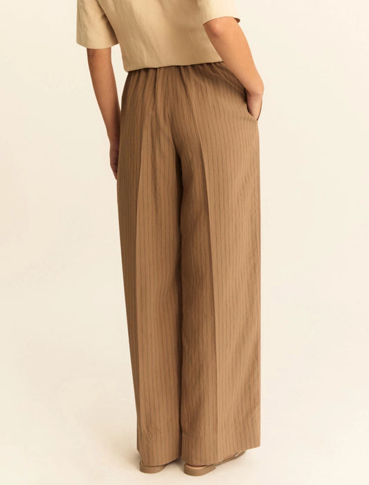 Pantaloni riga in tinta