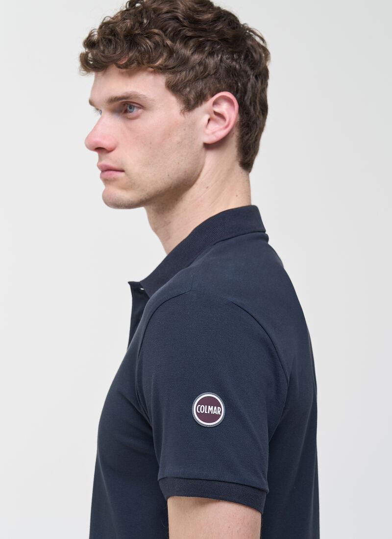 Polo logo manica