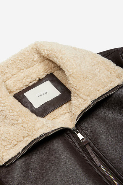 Giubbotto ecomontone polsi maglia