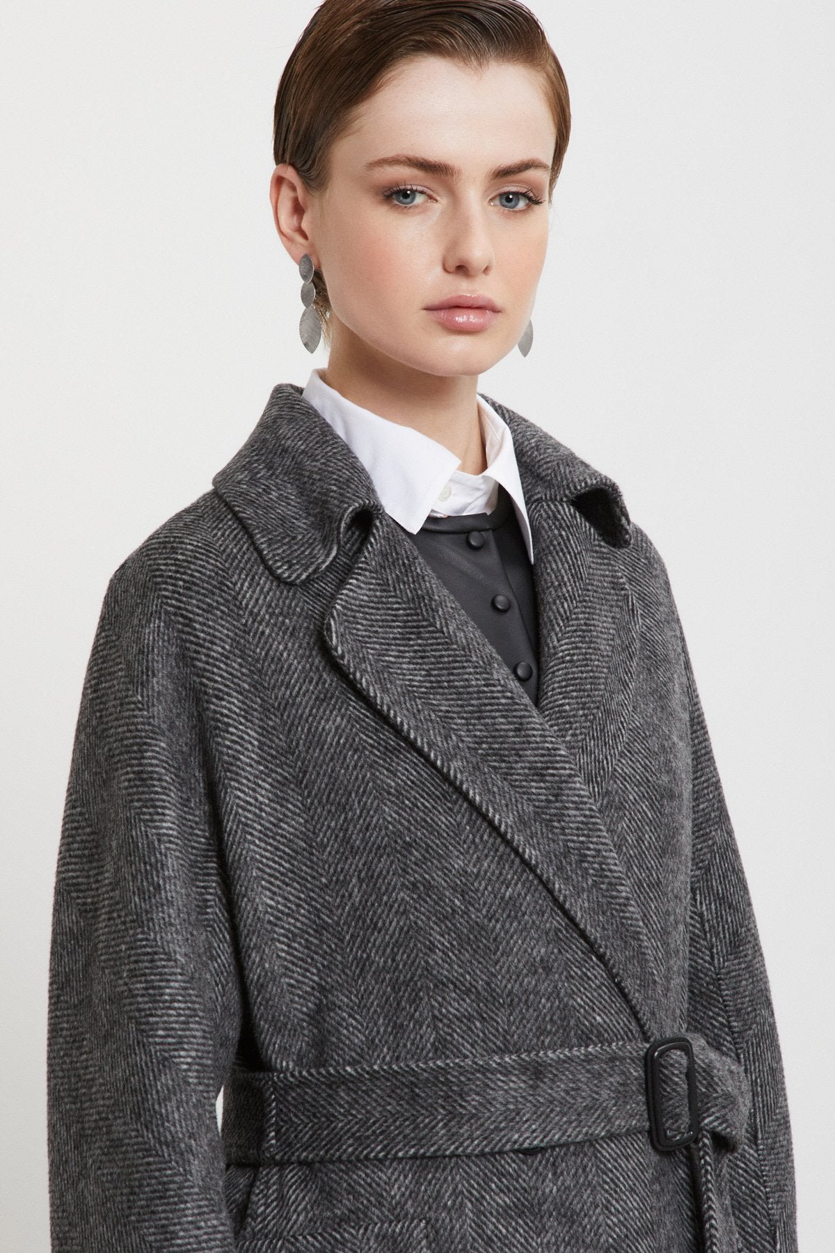 Cappotto spigato cintura