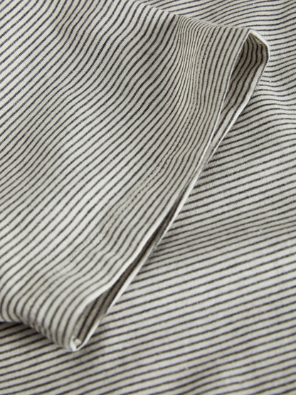 T-shirt righe bottoni scollo