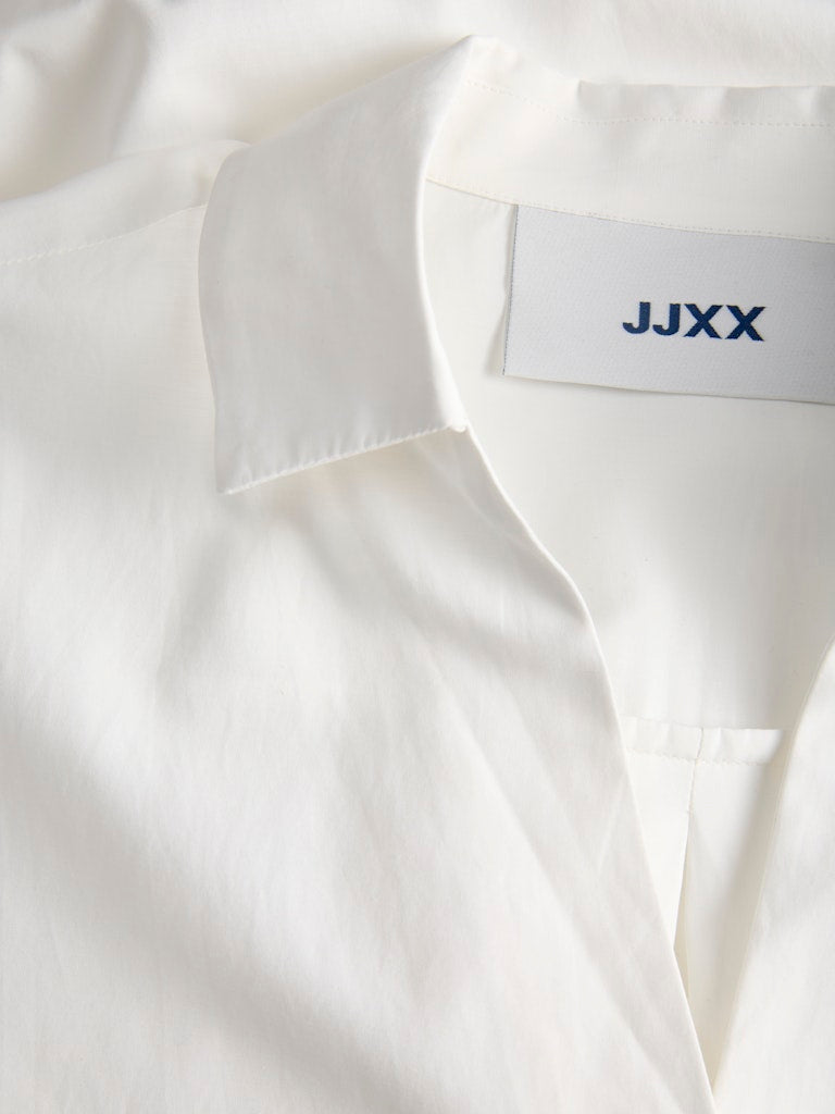 Camicia chiusa collo vela