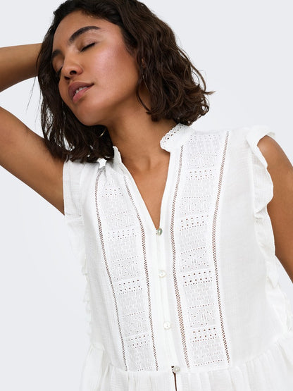 Camicia smanicata ricamata