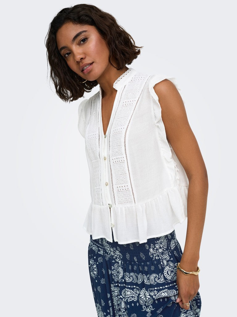 Camicia smanicata ricamata