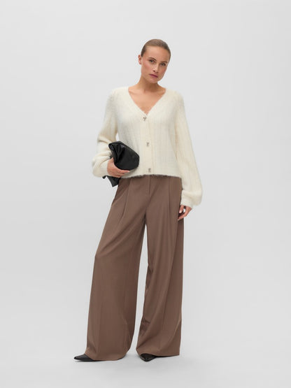 Cardigan bottoni fiocco