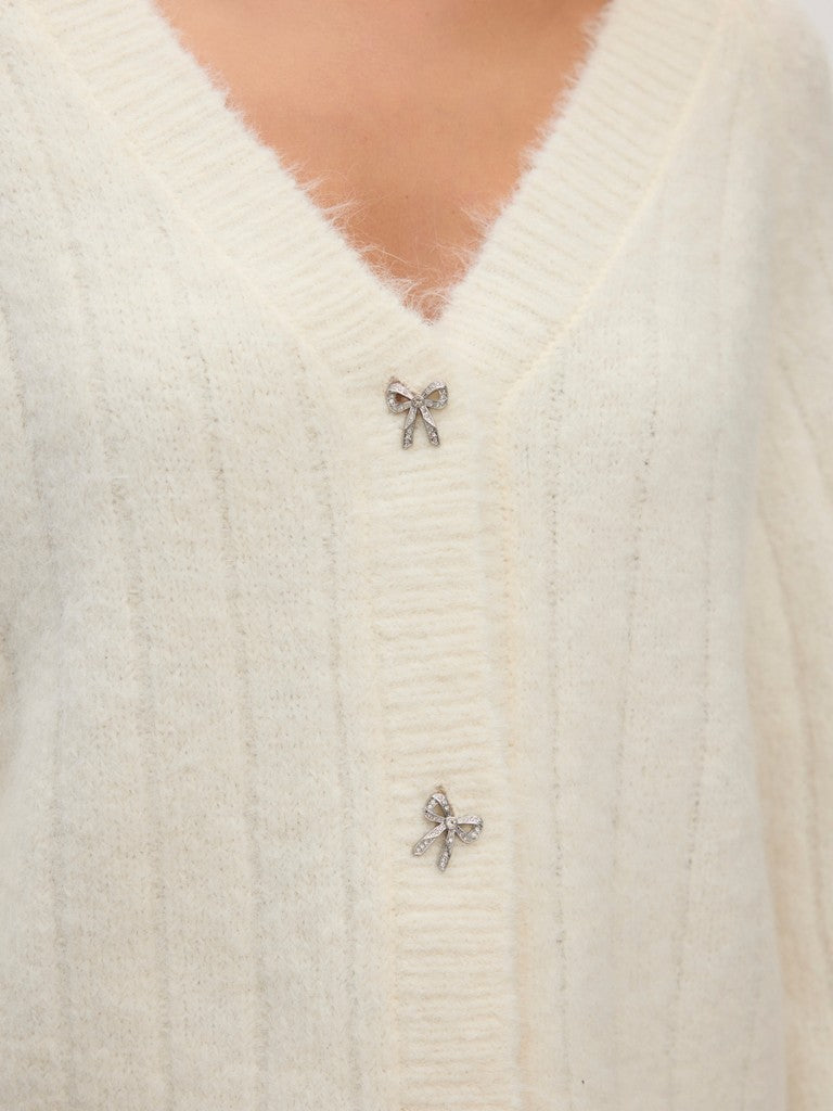 Cardigan bottoni fiocco